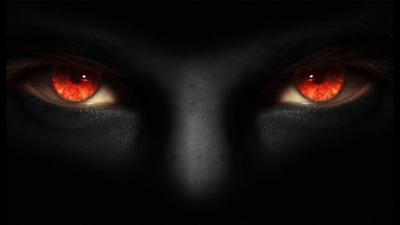 Чёрный кот с красными глазами