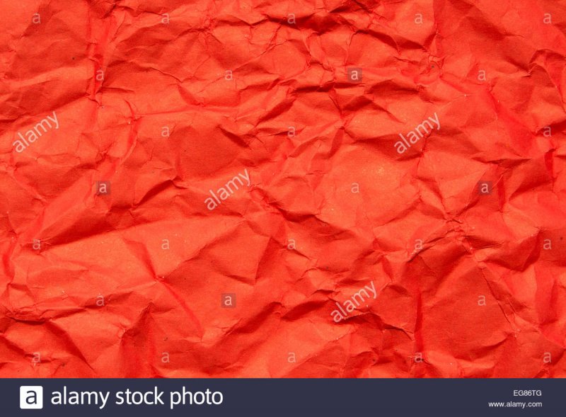 Смятая папиросная бумага красная