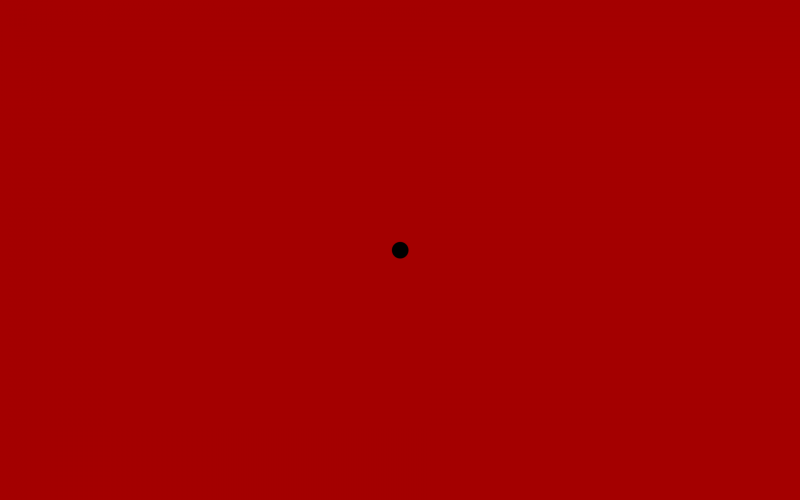 Красная точка на черном фоне
