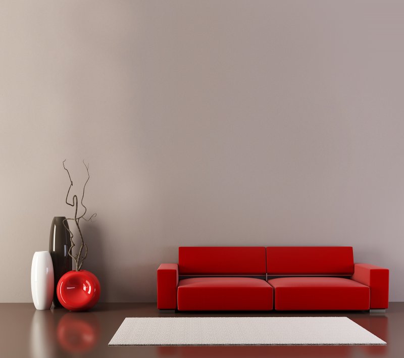 Красный диван и белые стены