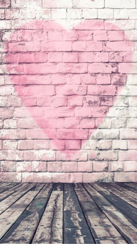 Розовая кирпичная стена фон