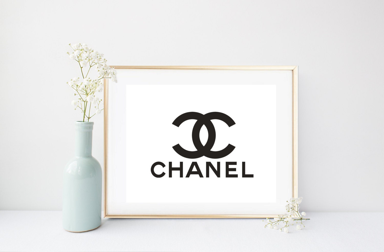 Коко Шанель эмблема