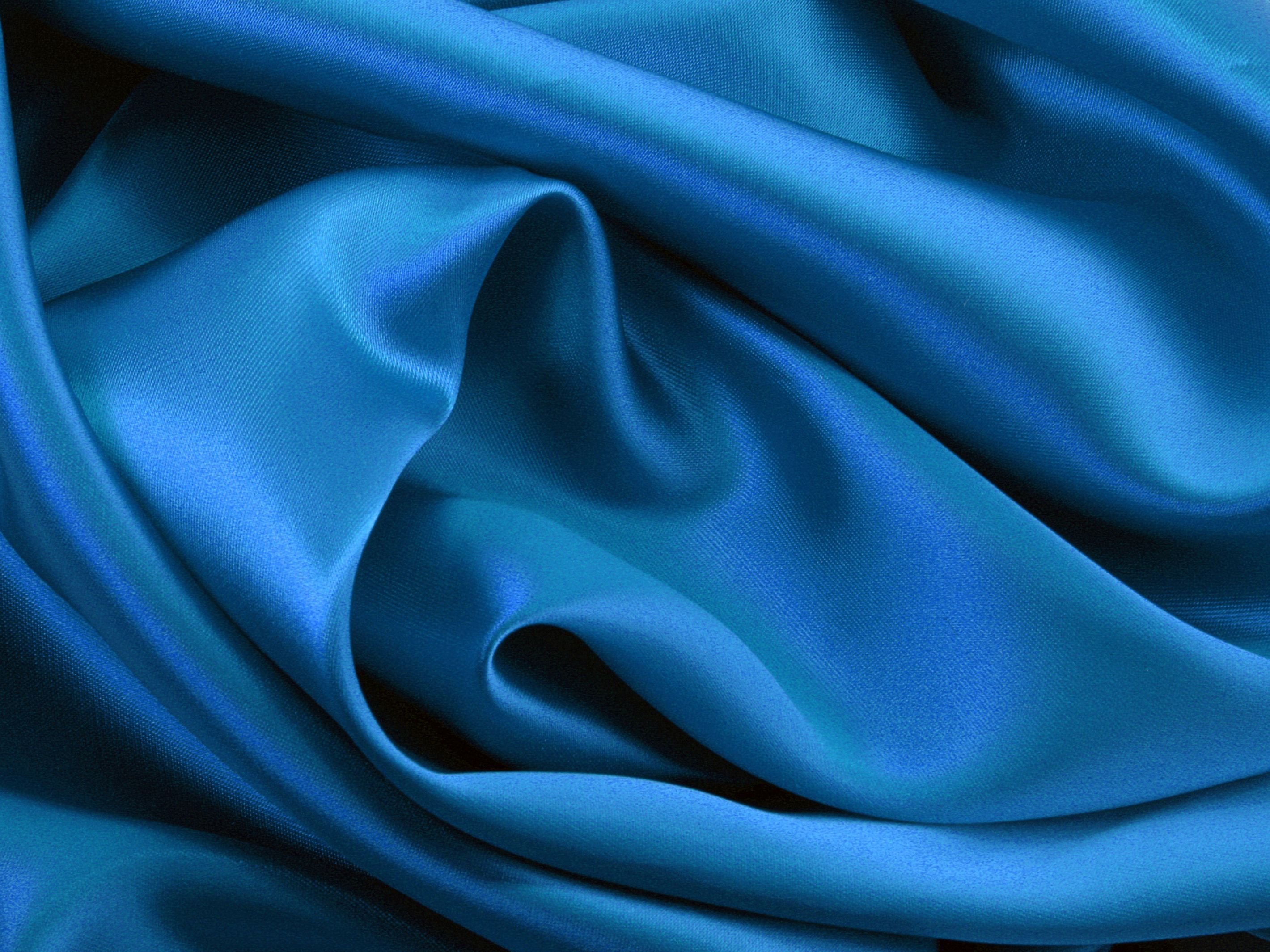 Материя складка. Голубой шелк. Красивые ткани. Голубая ткань. Синяя ткань.