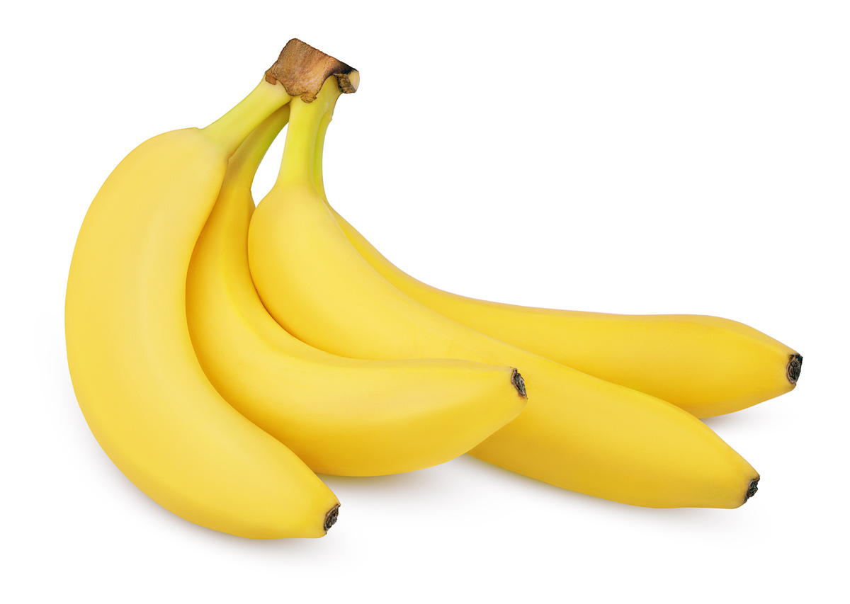 Четыре банана на белом фоне